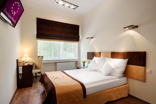 Ένα ή περισσότερα κρεβάτια σε δωμάτιο στο Boutique Hotel's Sosnowiec