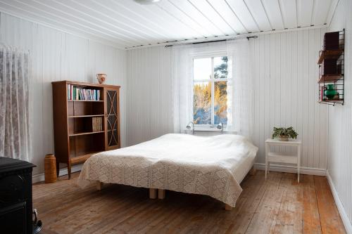 Postel nebo postele na pokoji v ubytování Torpet i Sjö