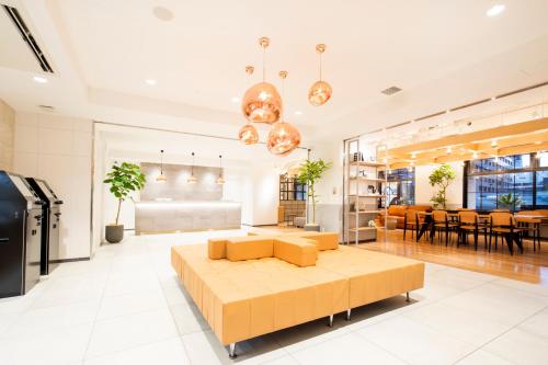 Ένα ή περισσότερα κρεβάτια σε δωμάτιο στο Fukuoka Toei Hotel