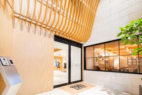 Ένα ή περισσότερα κρεβάτια σε δωμάτιο στο Fukuoka Toei Hotel
