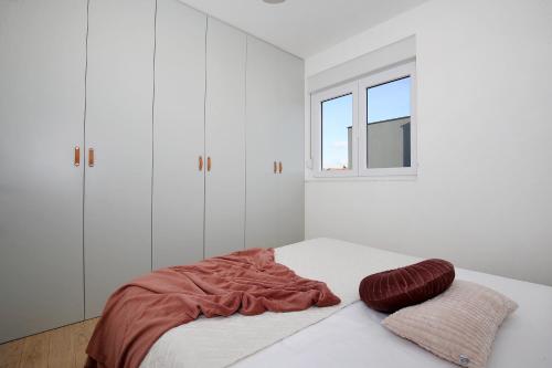Cama ou camas em um quarto em Esso Roof Terrace Apartment