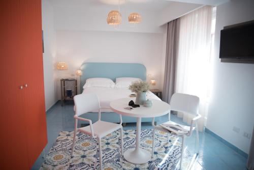 Postel nebo postele na pokoji v ubytování B&B Il Castello
