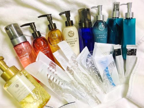 a group of different bottles of soap and perfume at Hotel Lumiere Gotenba (Adult Only) in Gotemba