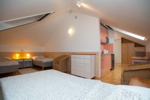 Postel nebo postele na pokoji v ubytování Piibutopsu Holiday House