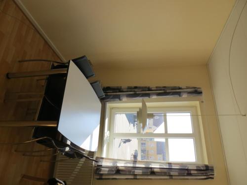 Et tv og/eller underholdning på Løkken Badehotel Apartments