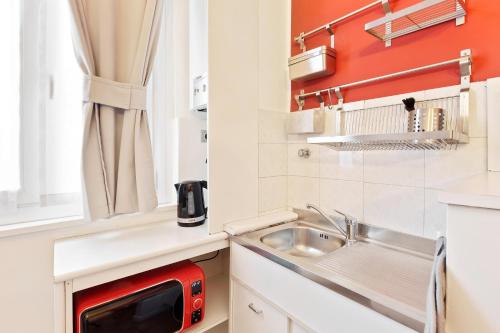 GuestHost - Cosy Nest Isola District Heart