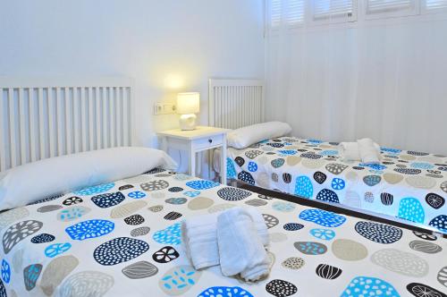 Postel nebo postele na pokoji v ubytování MyFlats Azul