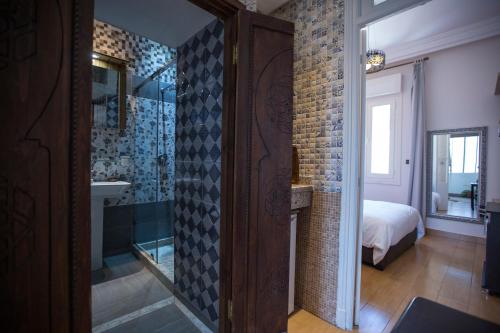 Koupelna v ubytování Appartements Rabat Balima Harcourt