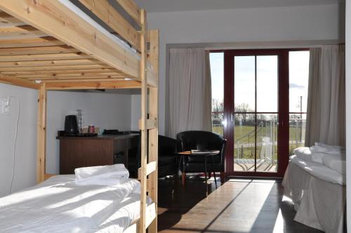 Postel nebo postele na pokoji v ubytování Hotel Bella Luna