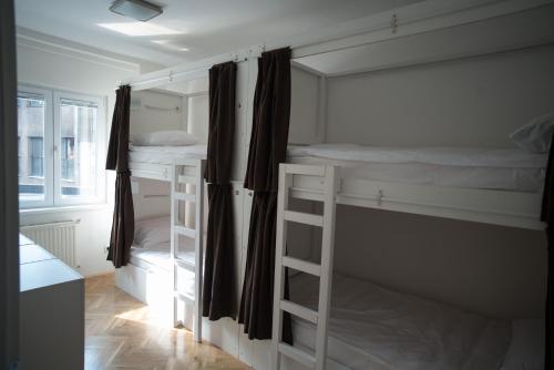 Ein Bett oder Betten in einem Zimmer der Unterkunft The Good Place Hostel