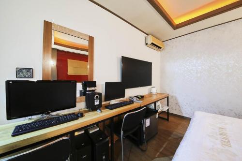 TV a/nebo společenská místnost v ubytování K2 Motel