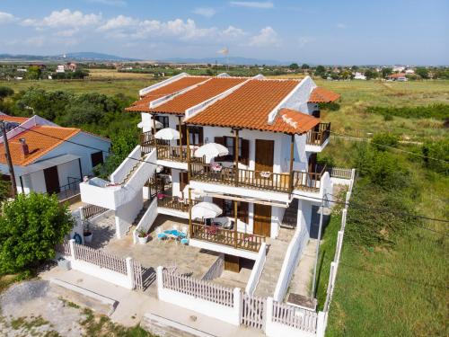 an aerial view of a house with a roof at F & B Summer Collection - Holiday Flats in Sozopoli
