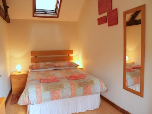 Voodi või voodid majutusasutuse Thorpegate Cottage toas