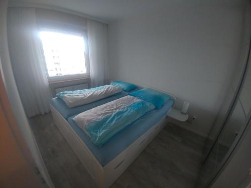 Giường trong phòng chung tại Grömitz am Meer