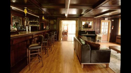 The lounge or bar area at The Woodbine Inn