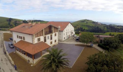 an aerial view of a house with a palm tree at Endaneta Berri in Zumaia