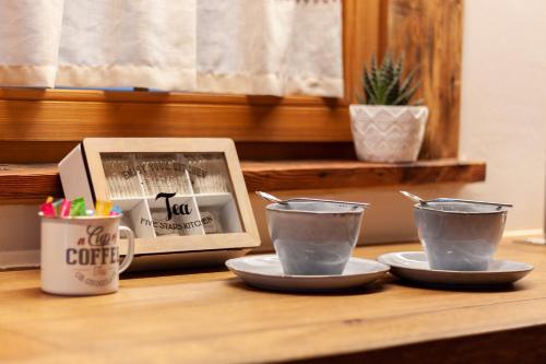 Chez « Adèle »にあるコーヒーまたはお茶