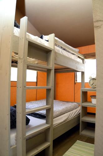 a bunk bed room with two bunk beds at Grande Glamping with Pool in Biograd na Moru