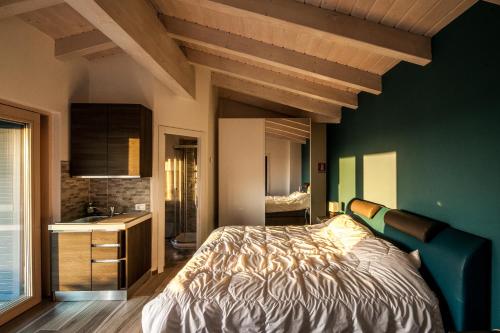 A bed or beds in a room at REFUGIUM CountryHouse