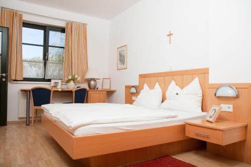 Cama o camas de una habitación en Pension Gartner