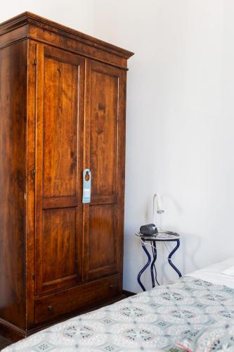 Una cama o camas en una habitación de Albergo Ristorante San Giors