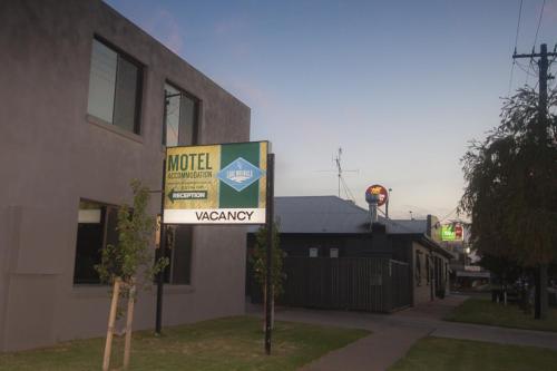 a motel sign in front of a building at Lake Mulwala Hotel in Mulwala