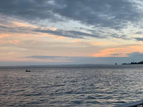 a boat in the middle of a large body of water at Colon Plaza Hotel in Tumaco