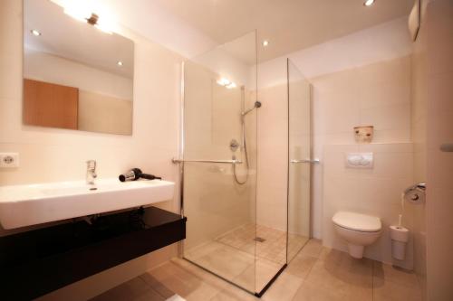 Bathroom sa EXCLUSIVE APARTMENTS - inclusive Zell am See-Kaprun Sommerkarte und unbegrenztem Tauern SPA Eintritt