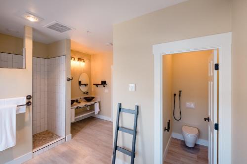 a bathroom with a shower and a toilet at The Barn B&B Walla Walla in Walla Walla