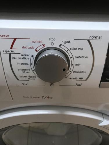 a close up of a washing machine with a knob at Villa with Heated Pool and Jacuzzi close to Puerto Banus and Beach in Estepona
