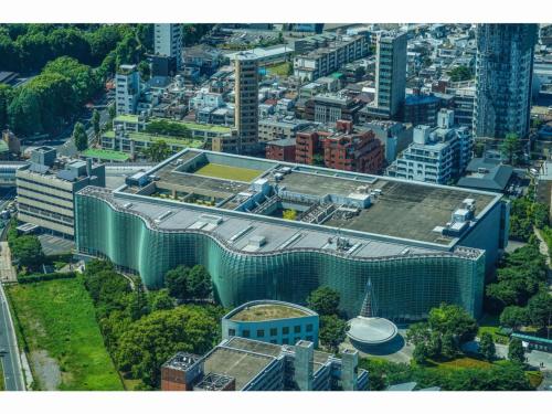 an overhead view of a large building in a city at KOKO HOTEL Shimbashi Onarimon - formerly Hotel Wing International Shimbashi Onarimon in Tokyo