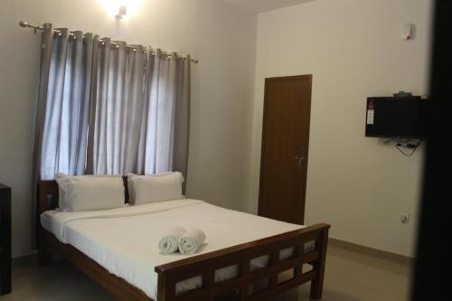 Ένα ή περισσότερα κρεβάτια σε δωμάτιο στο Zavon Holiday Home
