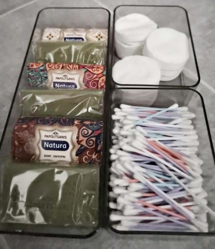 two plastic containers filled with different types of candy at Cozy Getaway in Nicosia in Yukarı Lakatamya