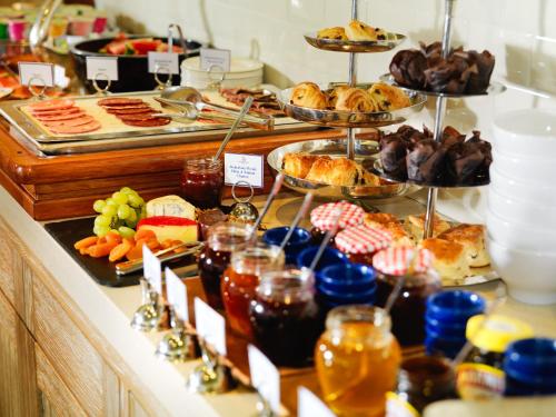 a buffet with a lot of different types of food at Inchydoney Island Lodge & Spa in Clonakilty