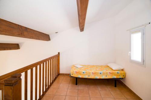 Ένα ή περισσότερα κρεβάτια σε δωμάτιο στο Vacancéole - Résidence Samaria Village - Hacienda Beach