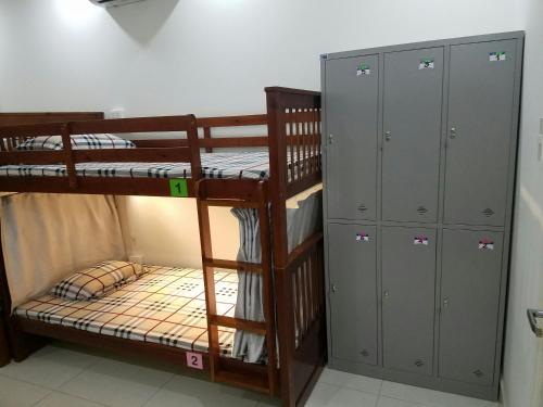 Giường trong phòng chung tại NATURAL HOUSE hostel