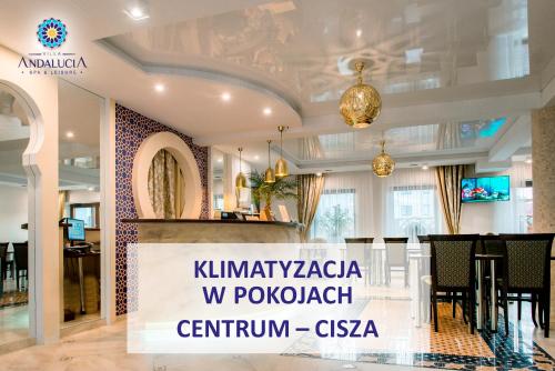 a lobby of a hotel with a sign that reads kimlyakova w p at Villa Andalucia SPA & Leisure in Ciechocinek