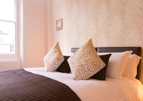 Un pat sau paturi într-o cameră la Thorne Lodge