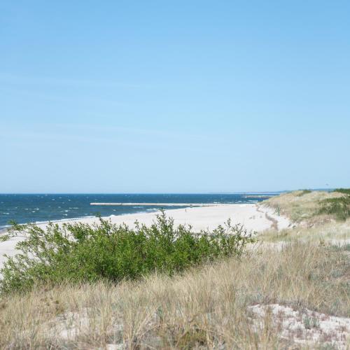a view of the beach from the bluff at The Sun by Lubicz in Ustka