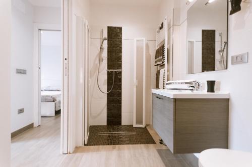 a bathroom with a shower and a sink at Casa Guetti Terme di Comano in Comano Terme