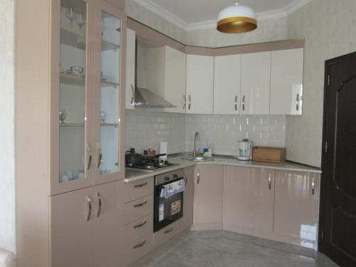 Kuchyň nebo kuchyňský kout v ubytování Jasmine