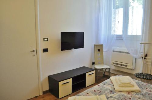 TV a/nebo společenská místnost v ubytování B&B Lecce Holidays