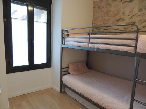 Postel nebo postele na pokoji v ubytování Ideal escapada romántica en el centro de Puigcerda