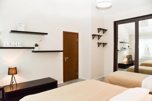 Cama o camas de una habitación en Garden View Home