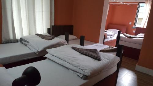 Cama o camas de una habitación en BnB Royal Tourist House