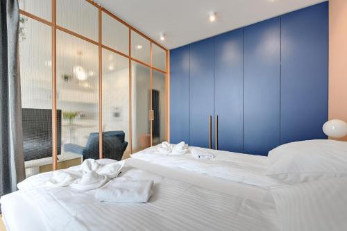 Posteľ alebo postele v izbe v ubytovaní Platinium Top Floor City View
