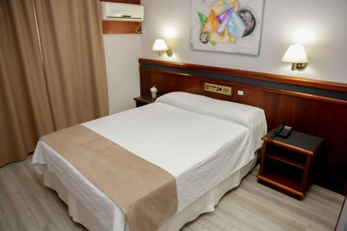 Katil atau katil-katil dalam bilik di Susin Hotel