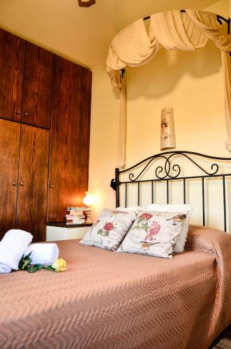 Ένα ή περισσότερα κρεβάτια σε δωμάτιο στο Casa in Pietra Vista Mare