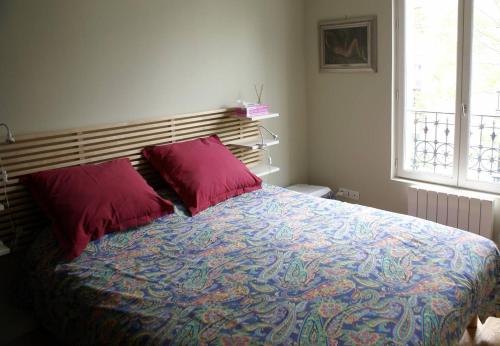 מיטה או מיטות בחדר ב-25 Rue du Télégraphe