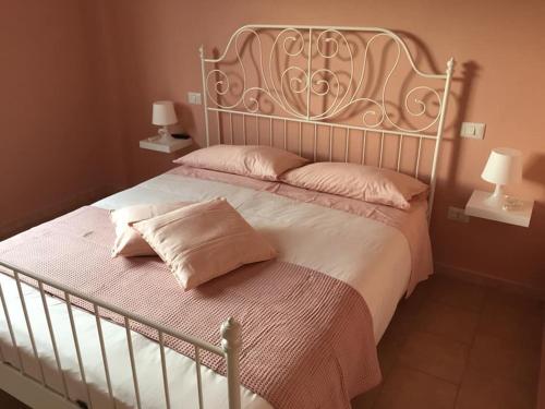 Ліжко або ліжка в номері Appartamenti Monte Alago